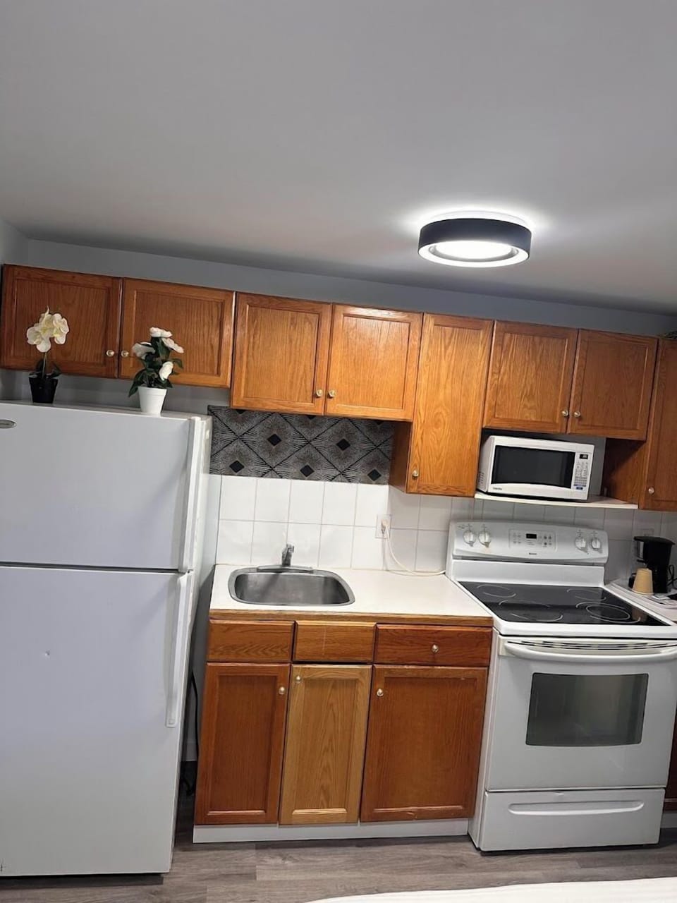 Standard Room, 2 Queen Beds, Kitchen | Private kitchen | Fridge, microwave, coffee/tea maker