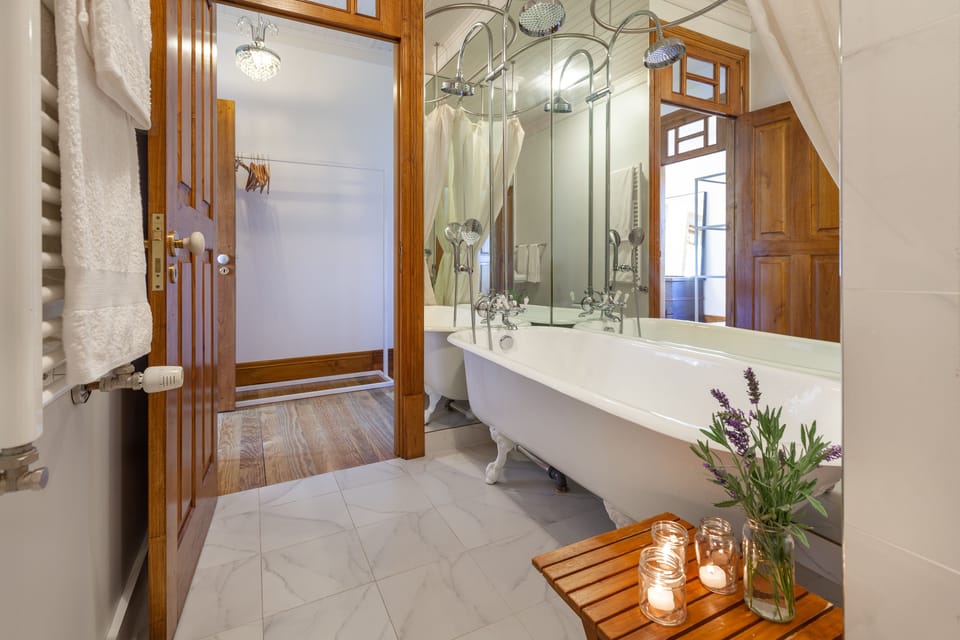 Suite | Bathroom | Rainfall showerhead, eco-friendly toiletries, hair dryer, bidet