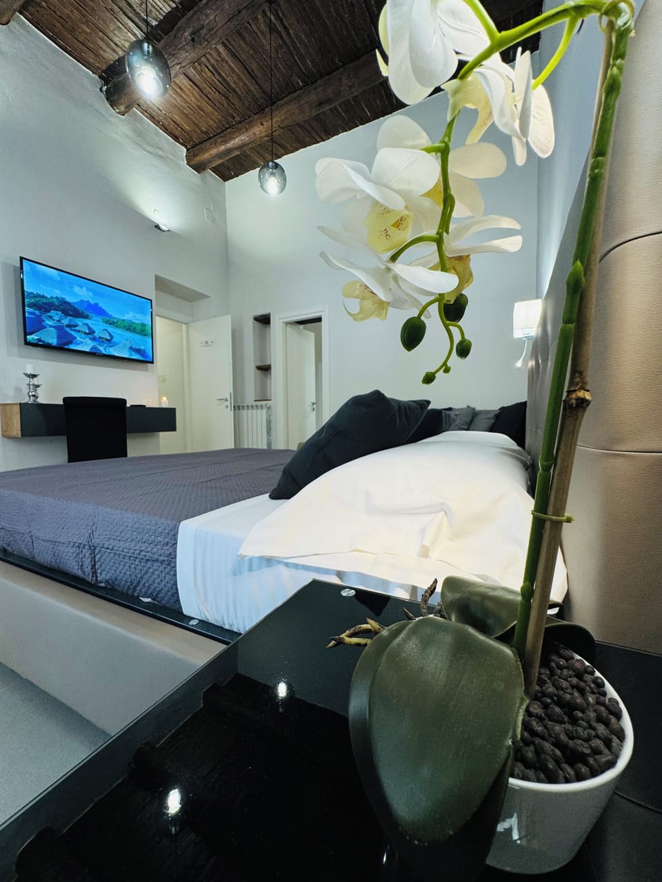 Deluxe Room, Balcony | In-room safe, blackout drapes, iron/ironing board, travel crib