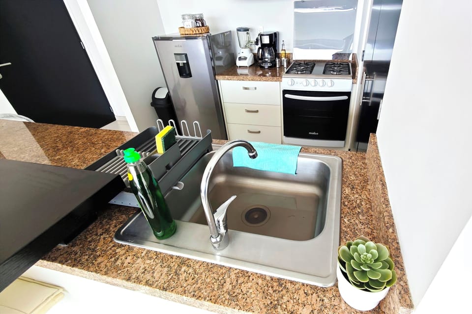Bright and beautifully appointed eat-in kitchen, fully equipped with everything you need to cook and enjoy meals at home.