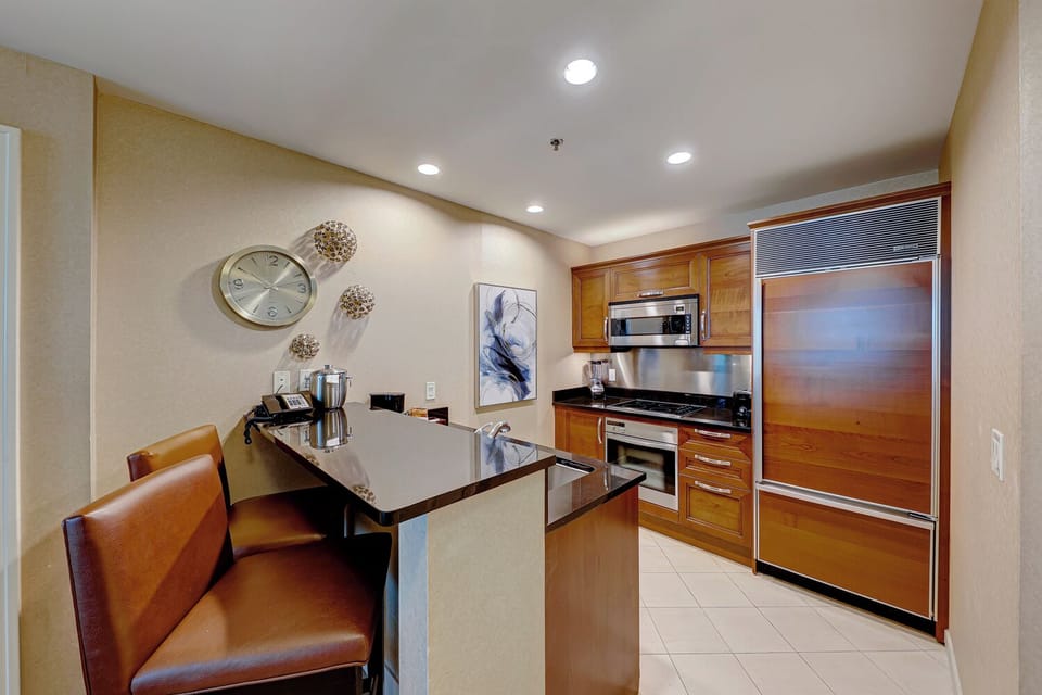 Signature Suite, 1 Bedroom, Balcony, City View | Private kitchen | Coffee/tea maker, electric kettle, freezer