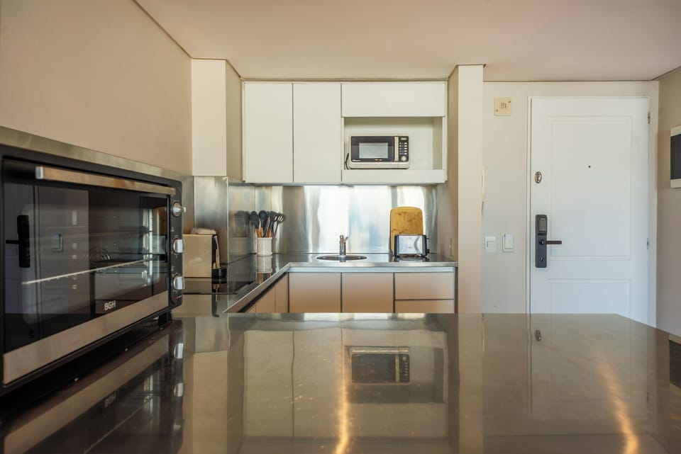 Family Apartment, River View | Private kitchen | Microwave, oven, stovetop, coffee/tea maker