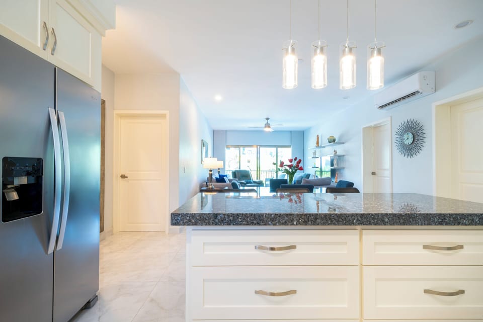 Deluxe Condo, Balcony, Garden View | Private kitchen | Electric kettle