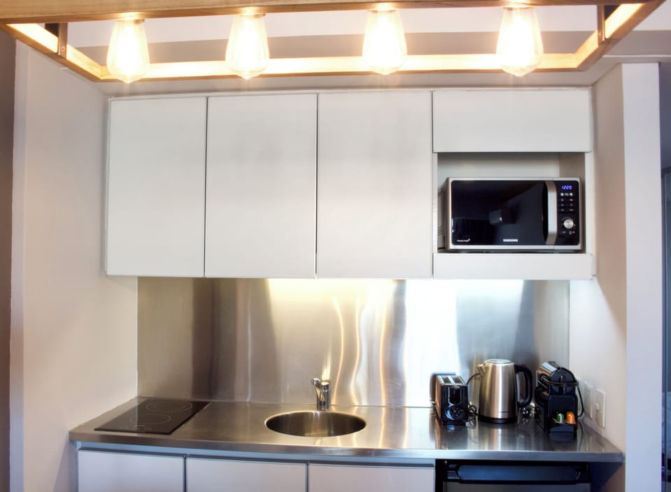 Classic Studio, City View | Private kitchen | Microwave, oven, stovetop, coffee/tea maker