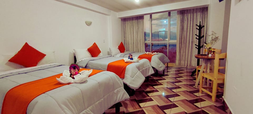 Family Room | Desk, WiFi (free), bed sheets