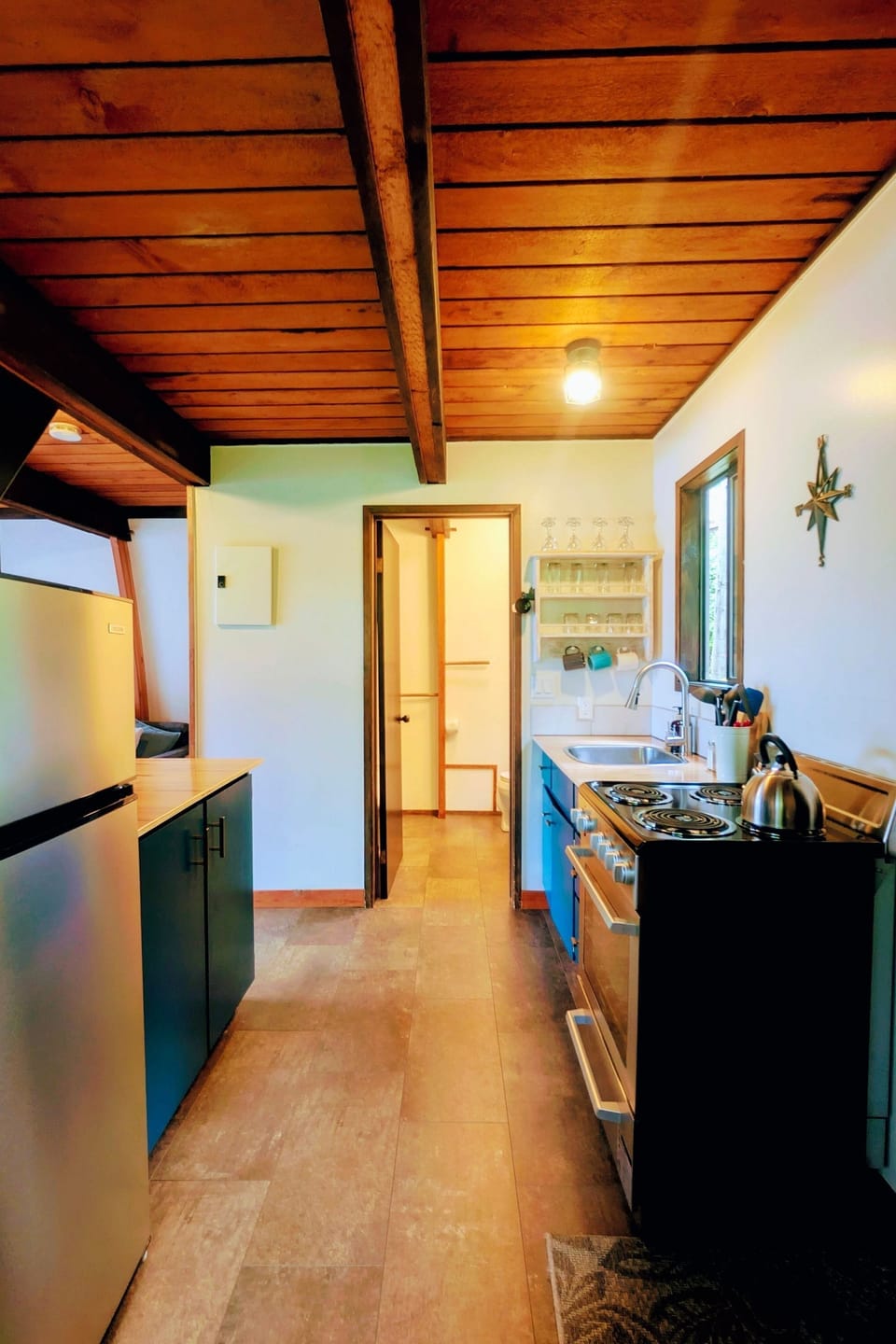 Ocean View Chalet #11 | Private kitchen | Microwave, oven, stovetop, coffee/tea maker