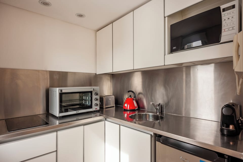 Classic Apartment, Balcony, City View | Private kitchen | Coffee/tea maker, electric kettle