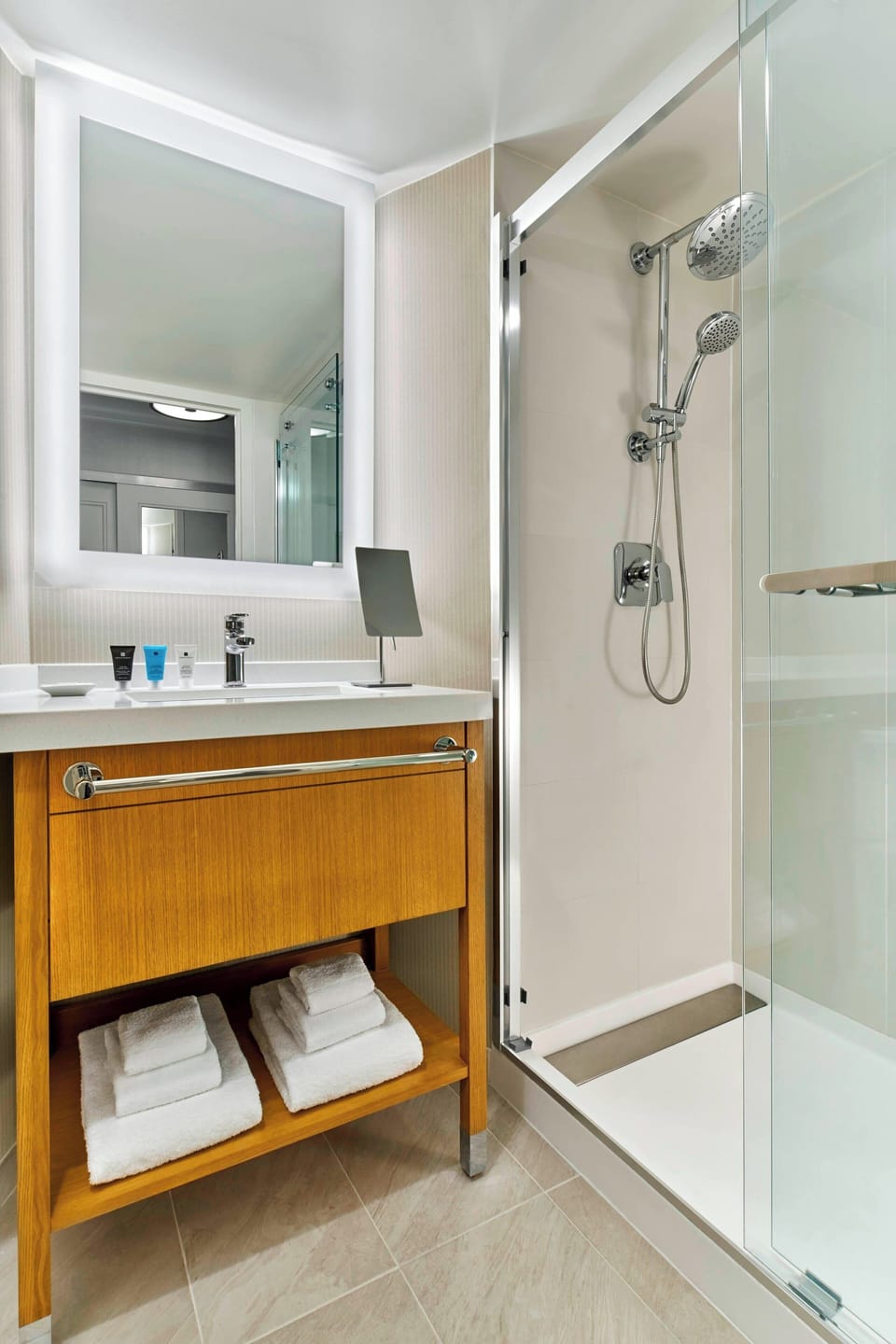 Designer toiletries, hair dryer, towels, soap