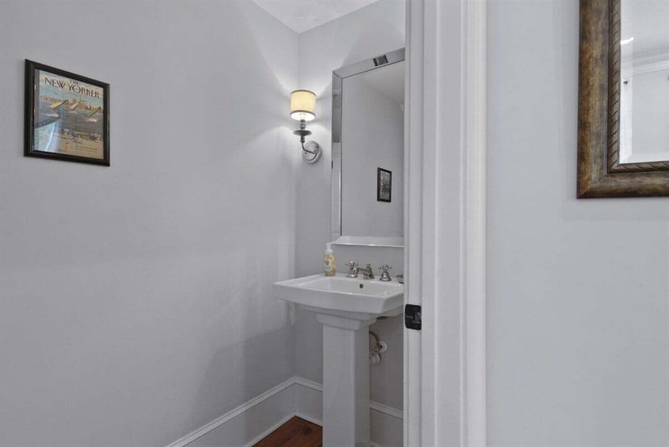 A little extra convenience on the main floor — perfect for guests and quick freshen-ups.