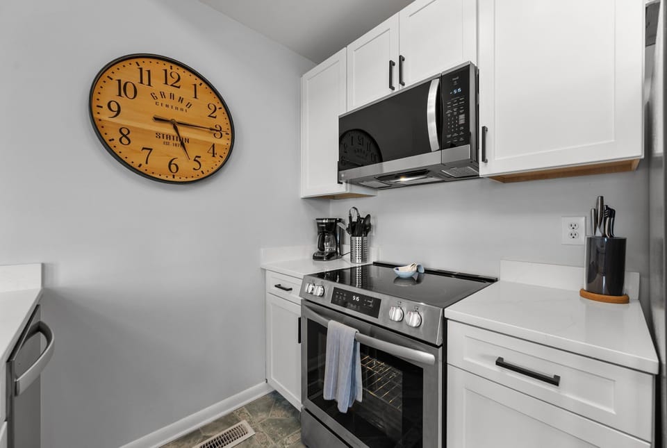 Fully equipped kitchen with modern appliances for all your cooking needs.