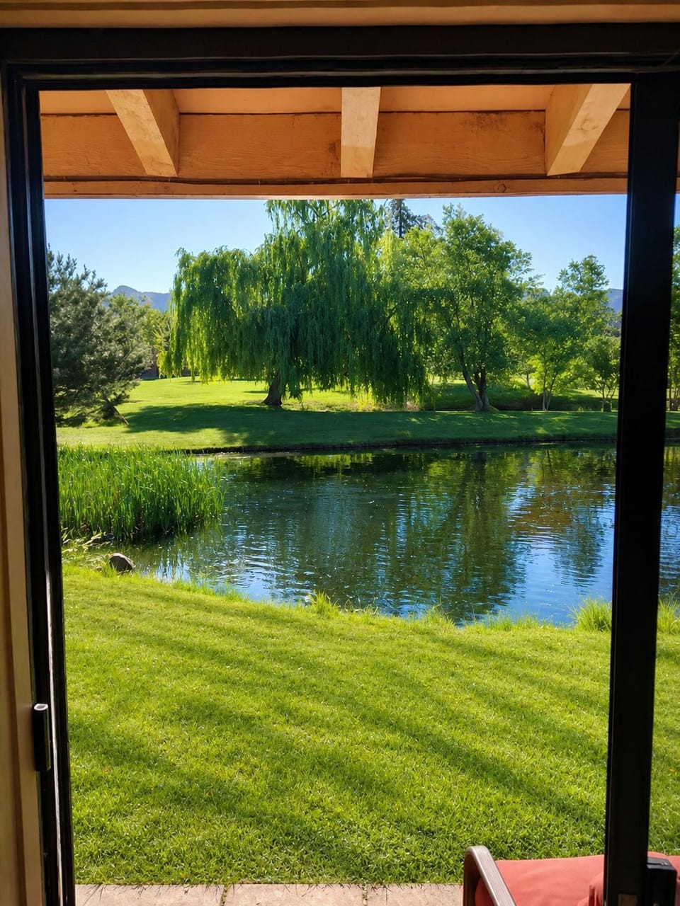 Delight in picturesque views from your room, where lush greenery meets tranquil waters, inviting you to savor every moment of peace and relaxation.