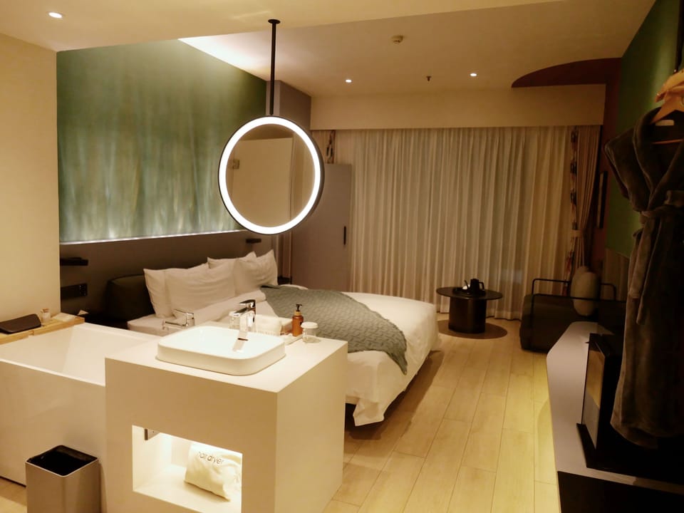 Family Quadruple Room, 2 Bedrooms | In-room safe, blackout drapes, soundproofing, iron/ironing board