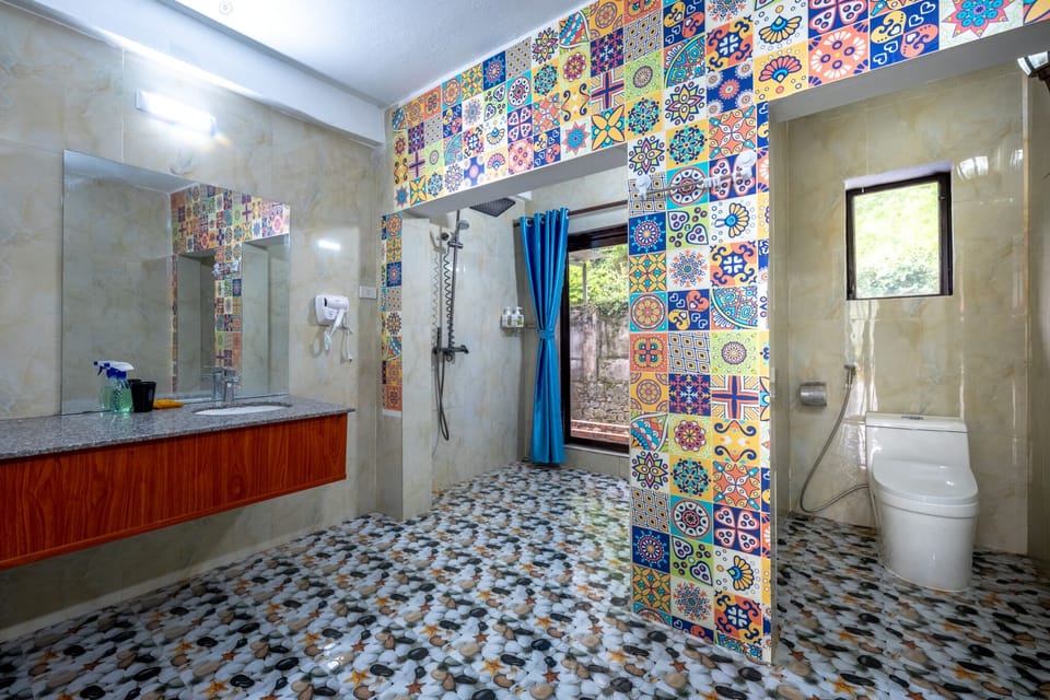 Quadruple Room, Patio, Mountain View | Bathroom | Shower, free toiletries, hair dryer, slippers