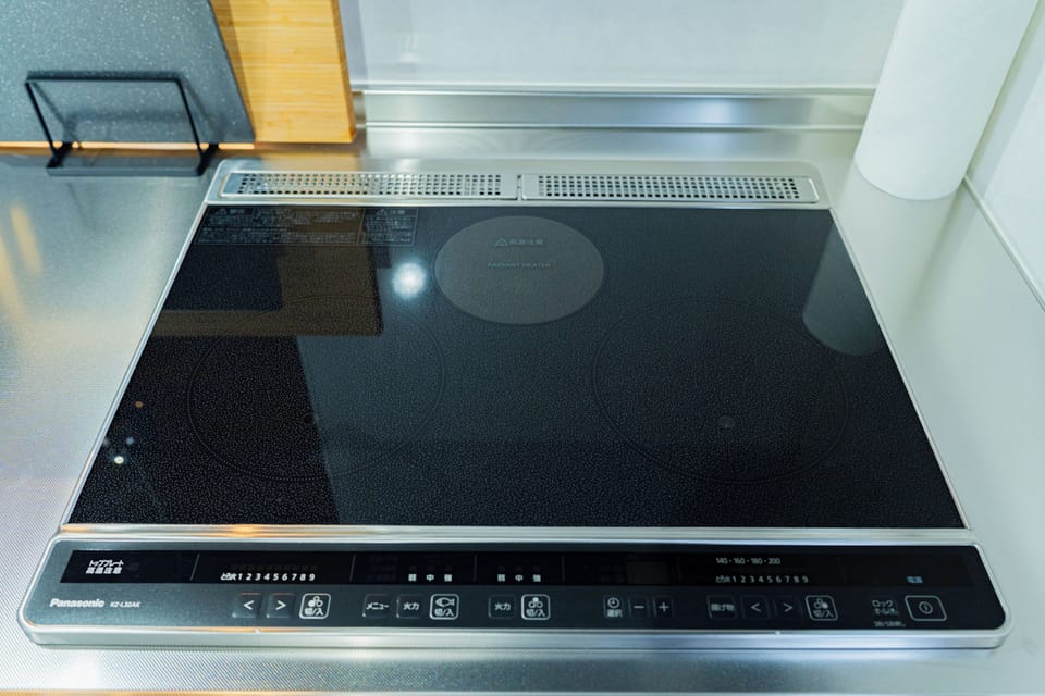 Full-size fridge, microwave, stovetop, toaster
