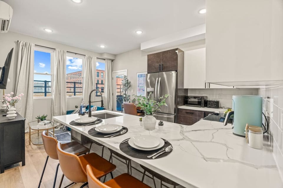 The dining area encourages you to gather with friends, enjoy a drink, and create lasting memories.