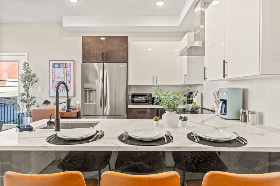 The dining area encourages you to gather with friends, enjoy a drink, and create lasting memories.