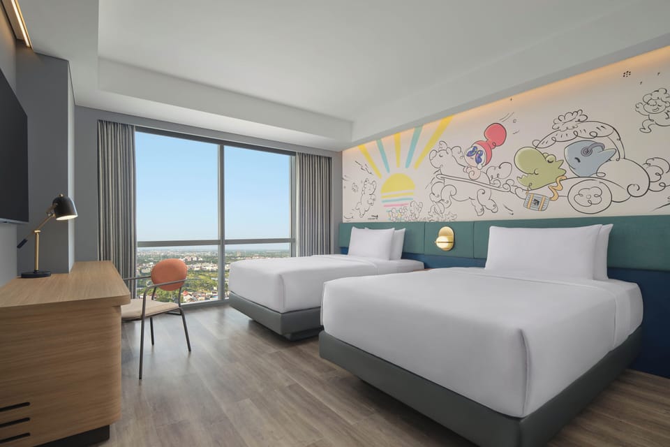 Deluxe Loft, 2 Twin Beds | In-room safe, desk, laptop workspace, blackout drapes
