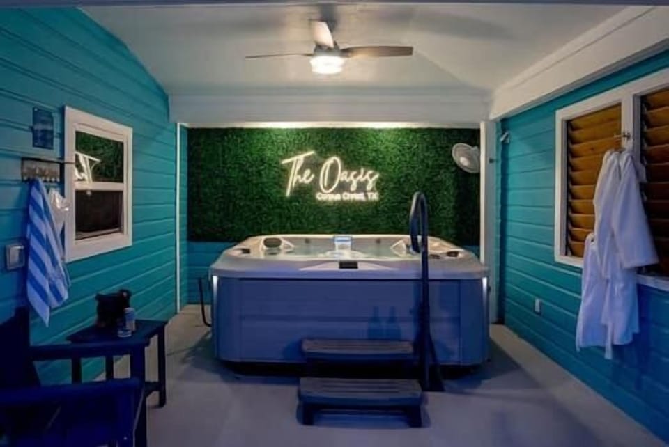 Backyard: Covered Hot Tub at night