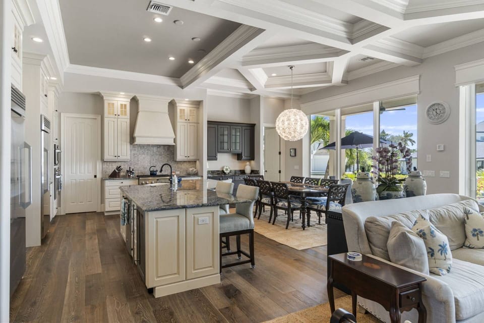 The expansive kitchen is open to the dining and living areas.