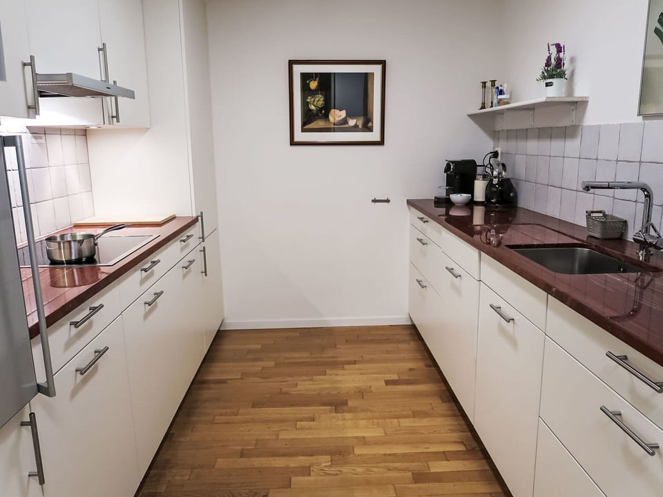 Flooring, Countertop, Kitchen, Cabinetry, Kitchen Appliance, Wood, Floor, Interior Design, Kitchen Sink, Wood Flooring