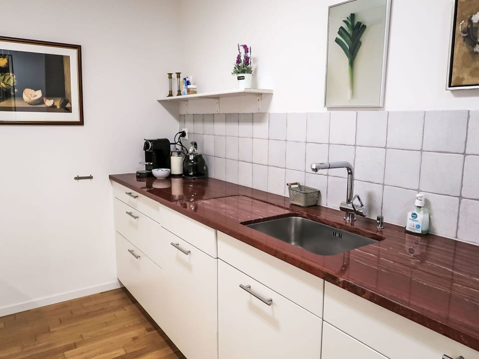 Countertop, Flooring, Wood, Cabinetry, Kitchen Sink, Kitchen, Plumbing Fixture, Floor, Interior Design, Tap
