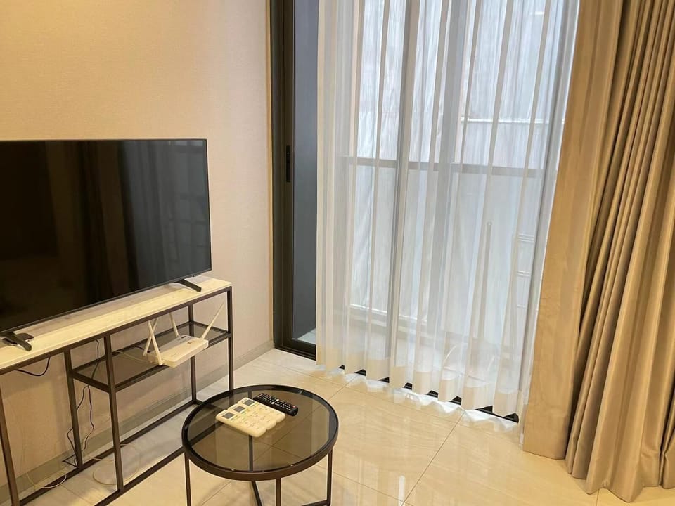 Classic Apartment, Balcony, City View | Living area | 40-inch LCD TV with cable channels