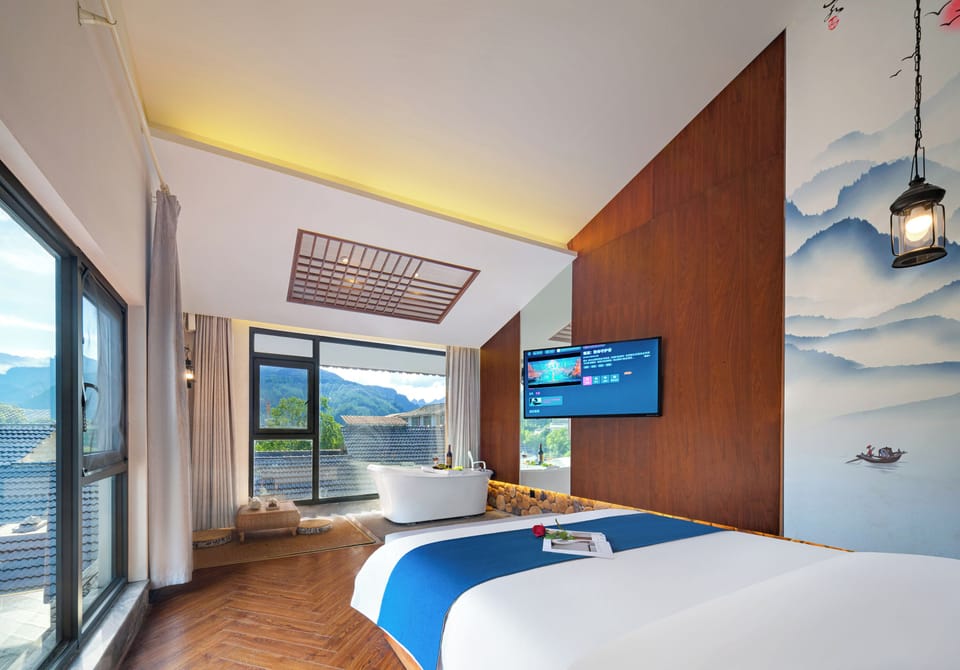 Luxury Double Room, 1 Queen Bed, Hill View, Poolside | Laptop workspace, blackout drapes, soundproofing, iron/ironing board