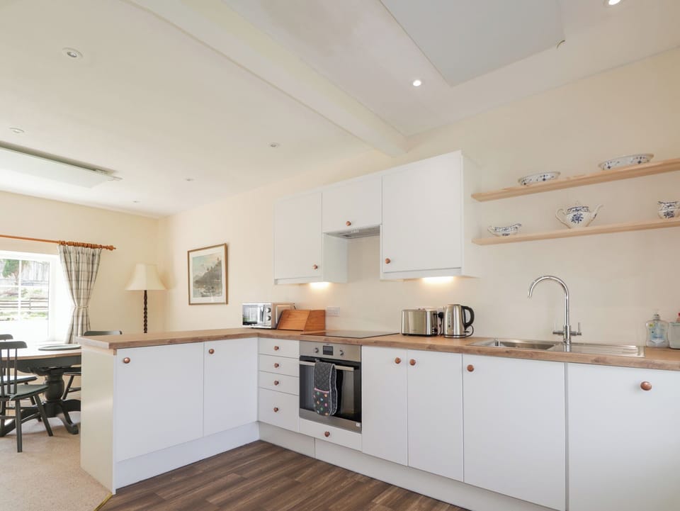 Fridge, microwave, toaster, cookware/dishes/utensils
