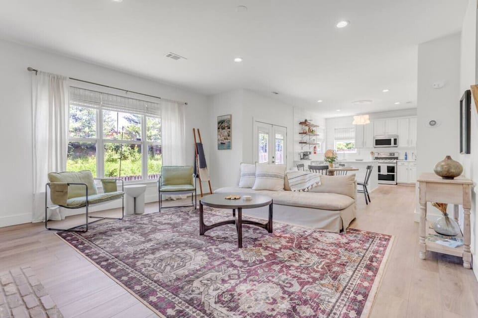 Walk into a spacious living room and open floor plan.