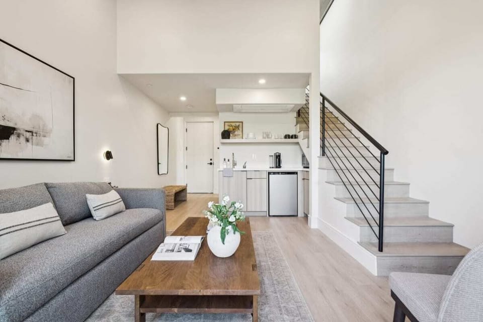 Living area with Queen Sized Sleeper Sofa & Kitchenette.