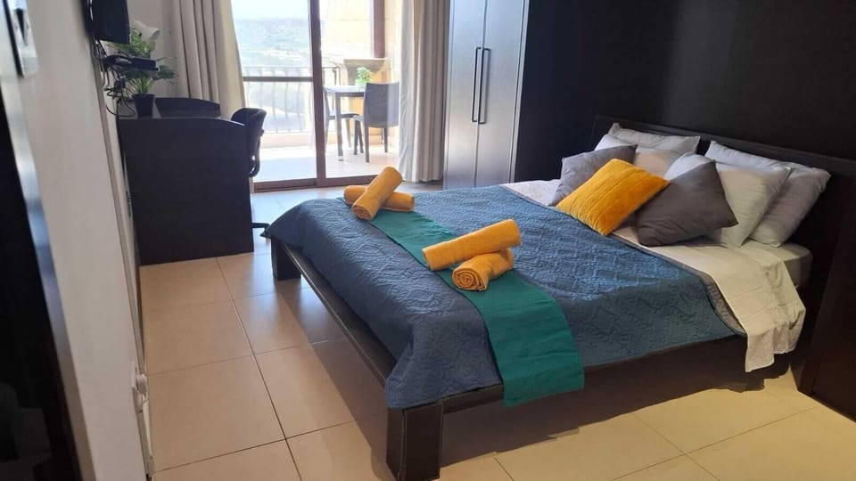 Deluxe Double Room, 1 Queen Bed, Balcony, Pool View | Soundproofing, iron/ironing board, free WiFi