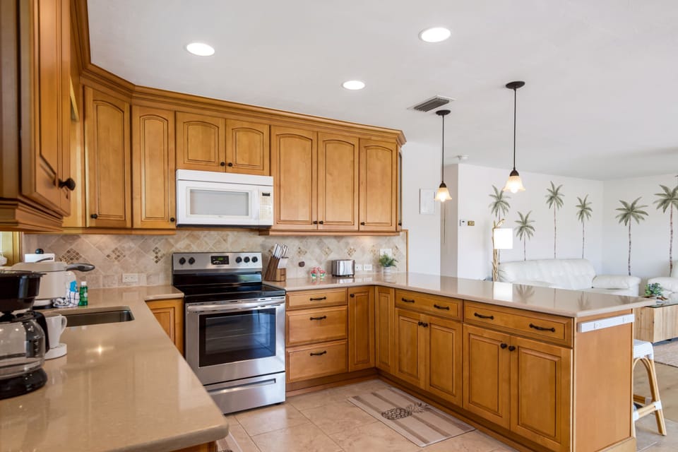 Step into this charming, open-concept coastal kitchen.