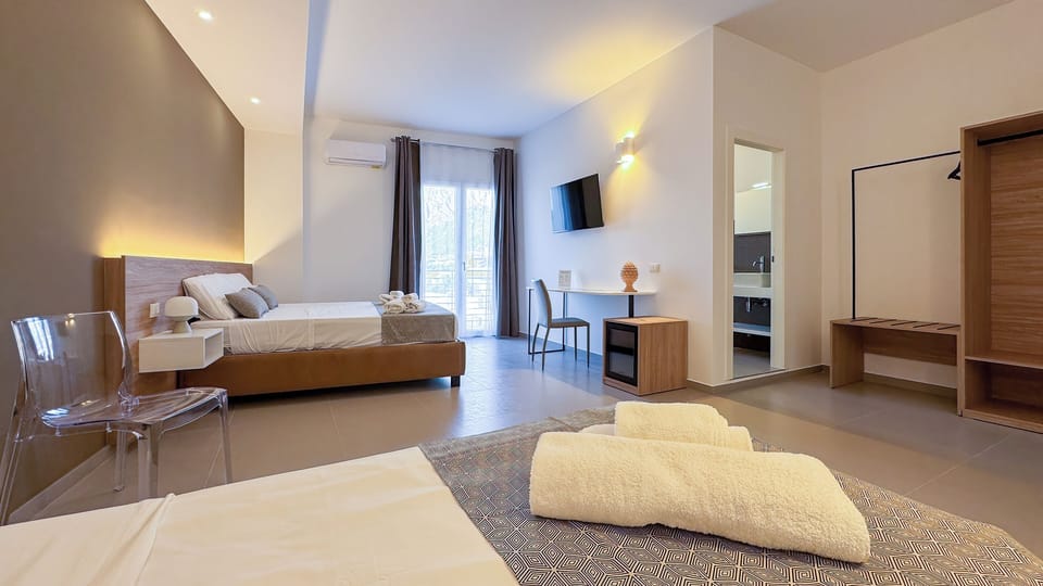 Superior Studio Suite, Balcony | Desk, laptop workspace, blackout drapes, soundproofing