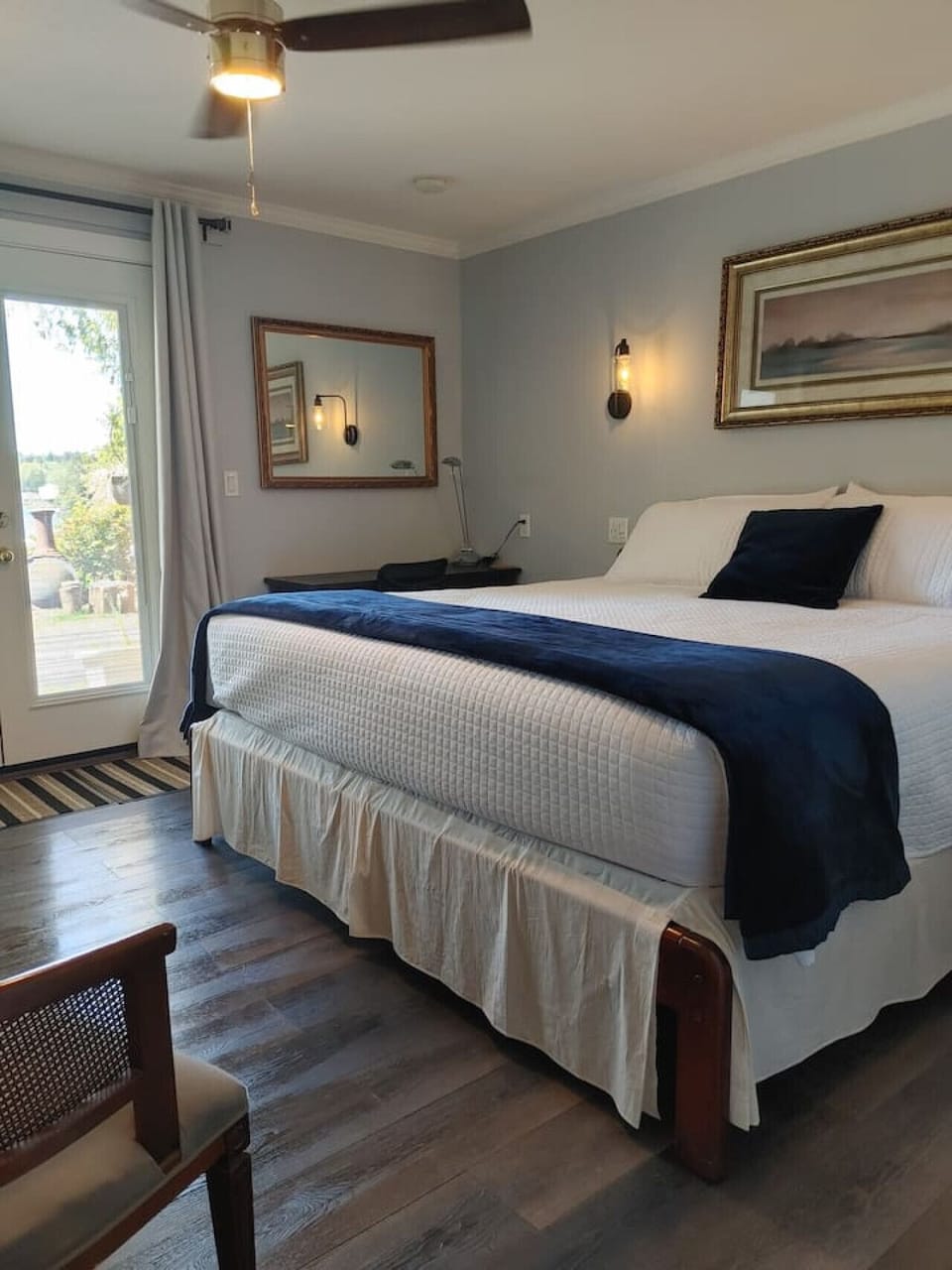 King Cove sleeping area with a workstation on the wall under the mirror