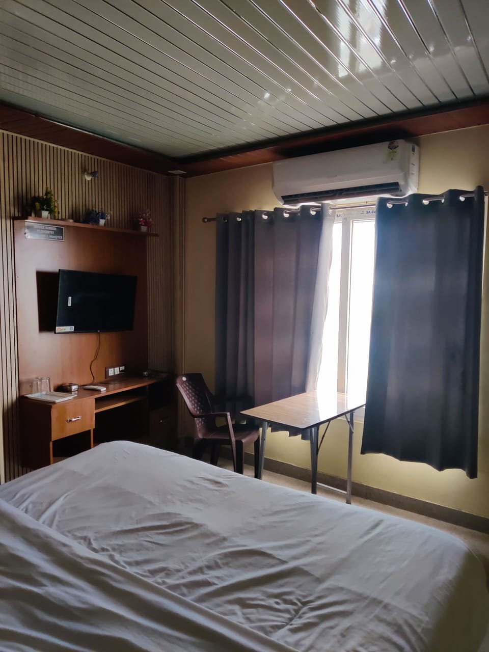 Deluxe Single Room, City View | In-room safe, desk, laptop workspace, blackout drapes