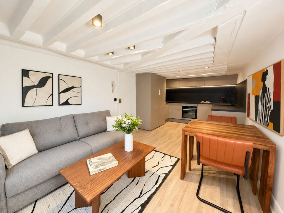 Apartment, Courtyard View | Living area | 80-cm Smart TV with digital channels