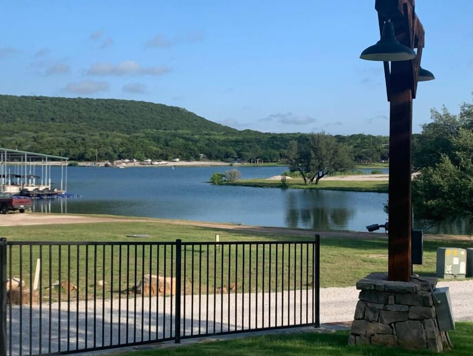 Public boat ramp view from our front patio. 1 minute drive. Great fishing in the cove.
