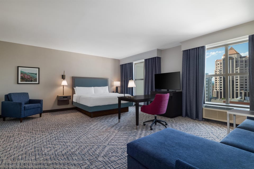 Studio, 1 King Bed, Accessible (Shower) | Living area | 42-inch LCD TV with cable channels, TV, pay movies