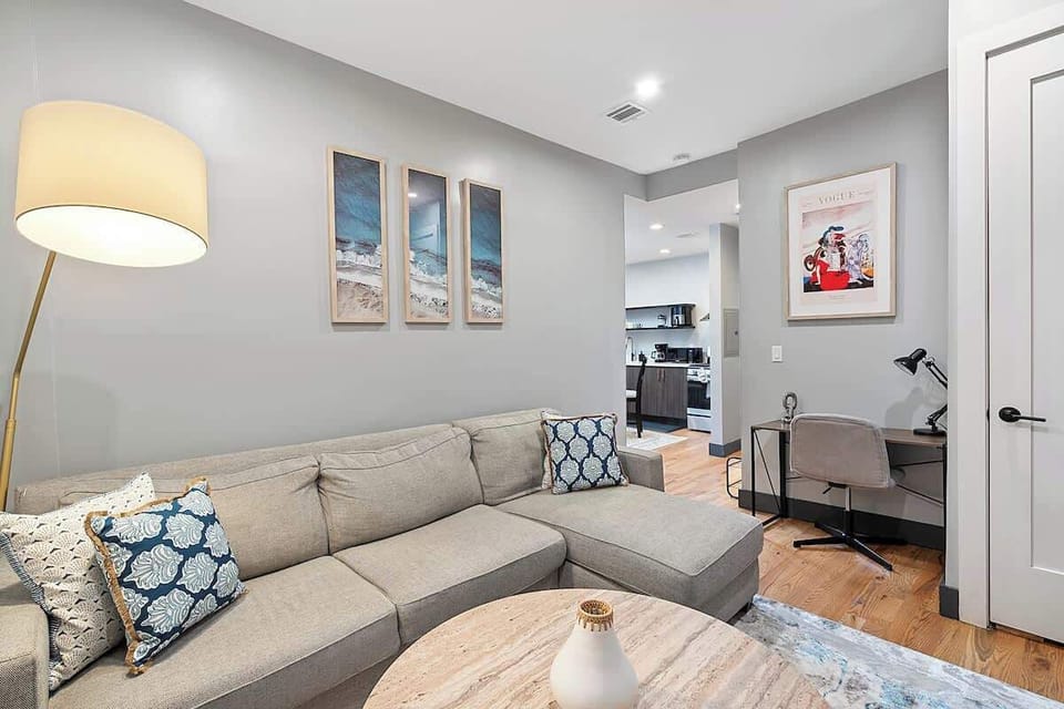 Neutral décor with pops of color adds a modern, welcoming vibe.