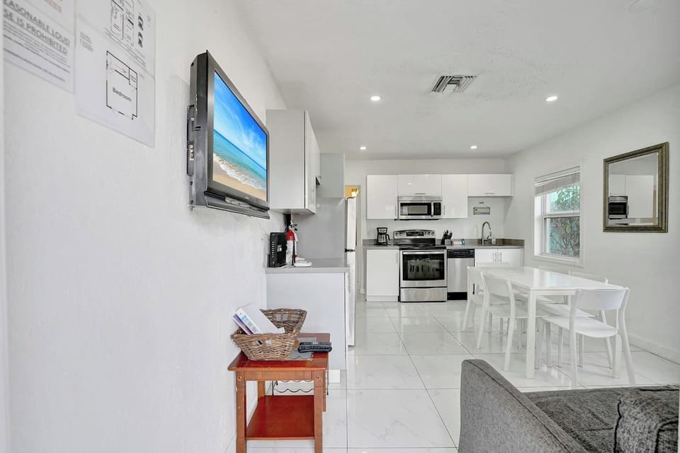 Kitchen & Dining Area: Bright, modern space perfect for cooking and gathering with friends!
