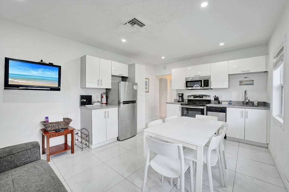 Kitchen & Dining Area: Modern design with sleek appliances and a bright, airy atmosphere!