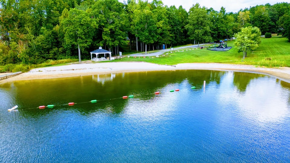 Enjoy access to community swimming pool, tennis courts, pickle ball, beach, and playground.