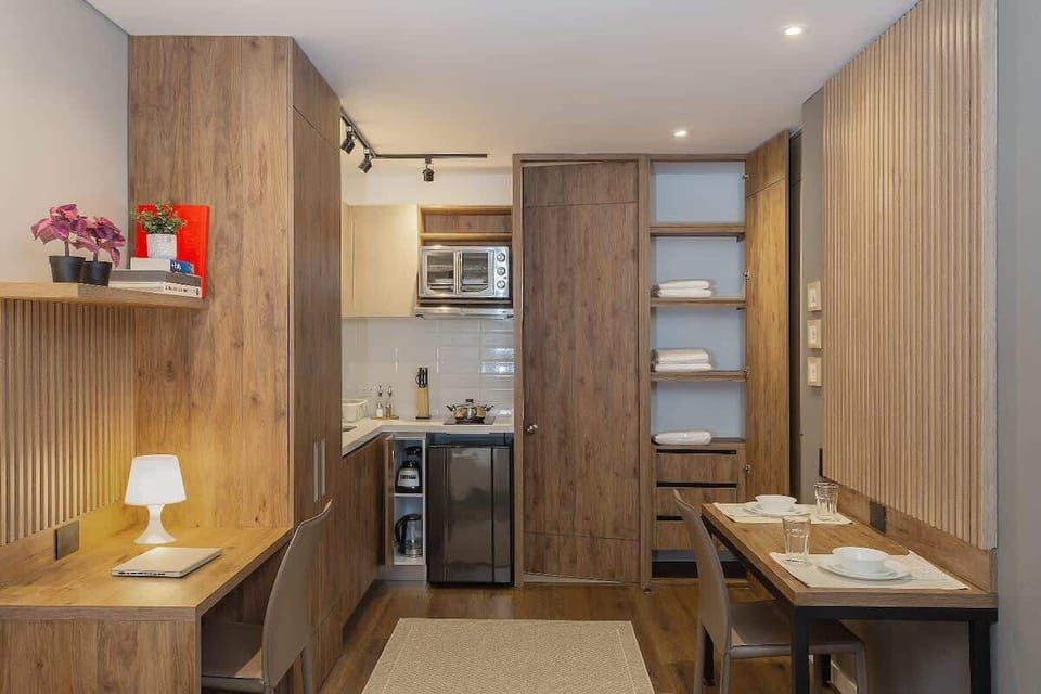 Apartment, 1 Queen Bed, Balcony, City View (UNIVERSAL 307) | 1 bedroom, individually decorated, individually furnished, bed sheets