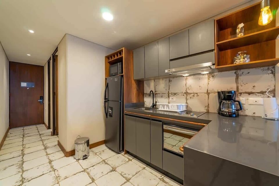 Apartment, 1 Queen Bed with Sofa bed, Balcony, City View (La Primera 416) | Private kitchen | Coffee/tea maker
