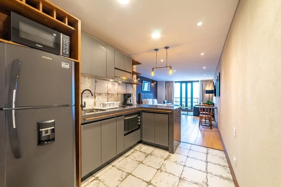Apartment, 1 Queen Bed with Sofa bed, Balcony, City View (La Primera 416) | Private kitchen | Coffee/tea maker