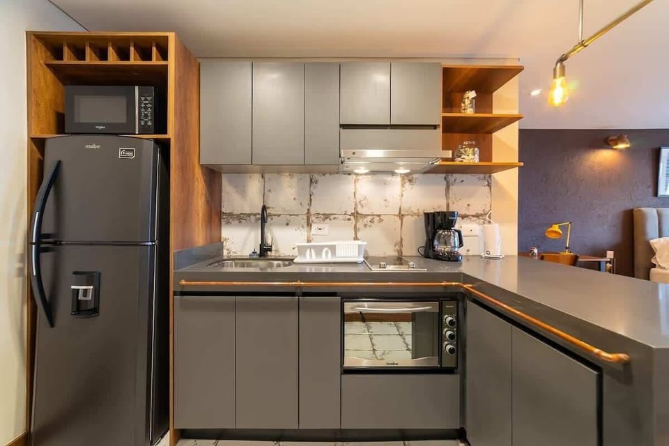 Apartment, 1 Queen Bed with Sofa bed, Balcony, City View (La Primera 416) | Private kitchen | Coffee/tea maker