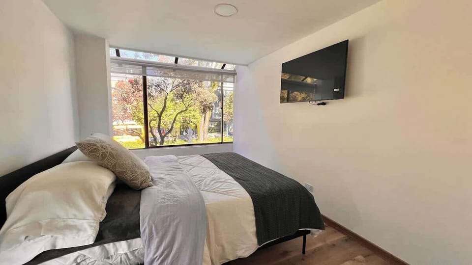 Apartment, Multiple Beds, Balcony, City View (9211 202) | 2 bedrooms, individually decorated, individually furnished, bed sheets