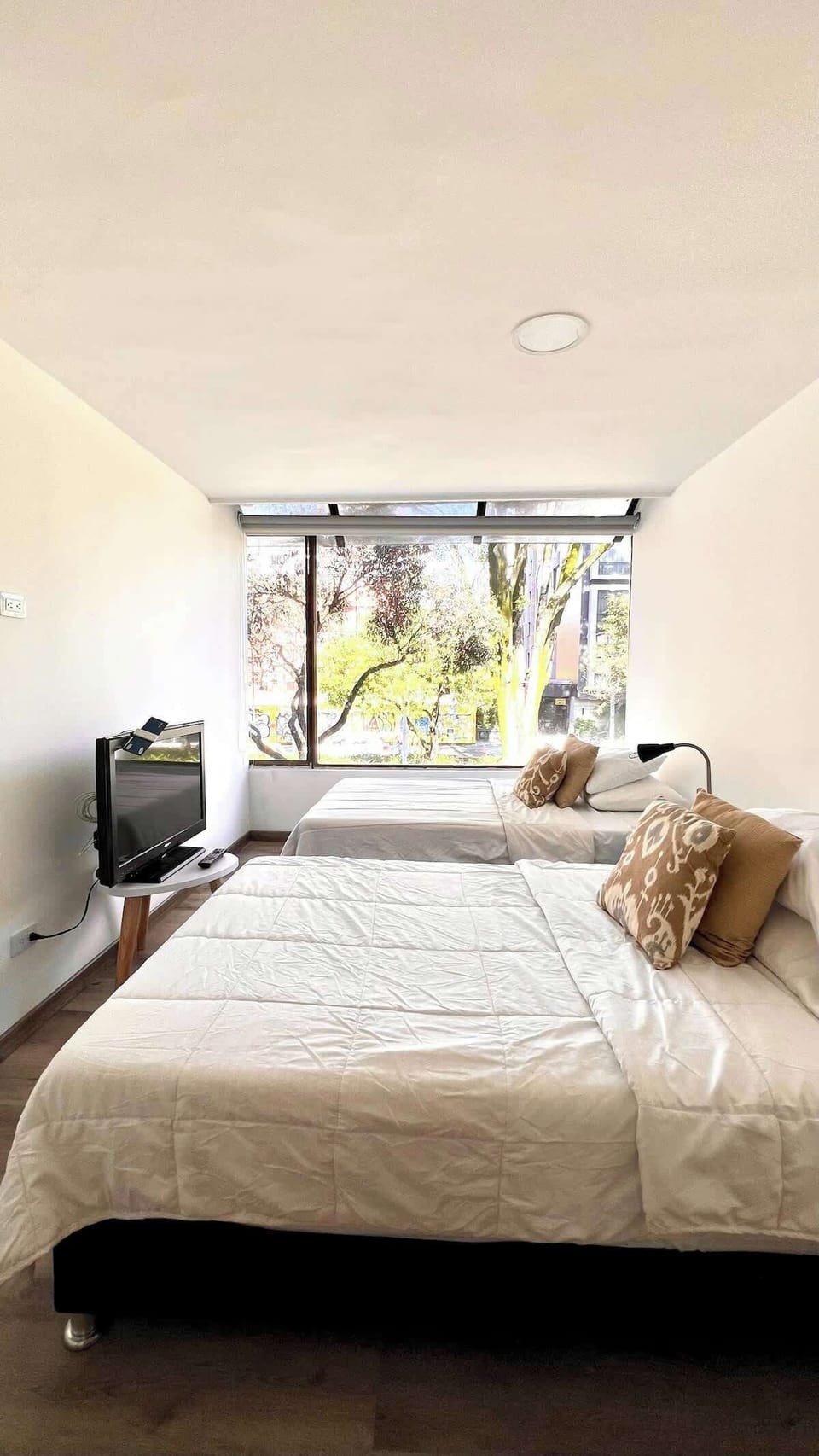 Apartment, Multiple Beds, Balcony, City View (9211 202) | 2 bedrooms, individually decorated, individually furnished, bed sheets