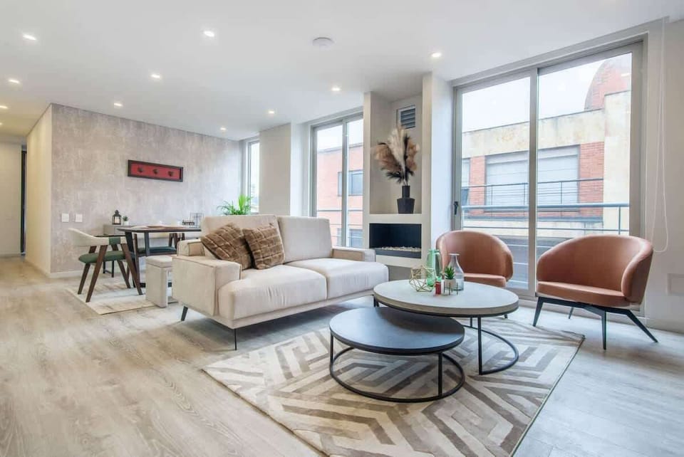 Apartment, Multiple Beds, Balcony, City View (Balcones 402) | Living area | Fireplace