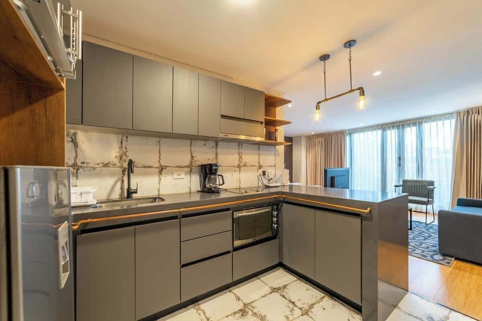 Apartment, 1 Queen Bed with Sofa bed, Balcony, City View (La Primera 314) | Private kitchen | Coffee/tea maker